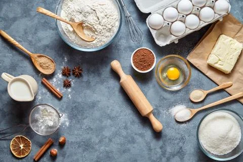 The process Baking cake in kitchen - dough recipe ingredients eggs, flour, milk Stock Photos