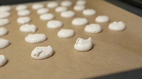 The process of baking by cutting out colourful biscuits with your close friends Stock Footage 295762064