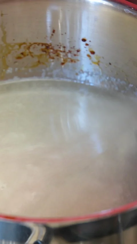 Process of baking Easter bread with raisins soaked in cognac. homemade holiday Stock Footage 346186124