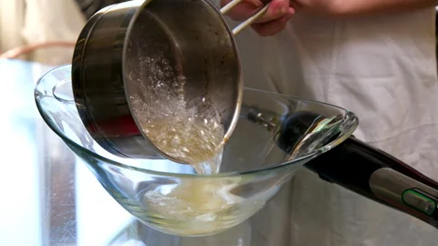 Process of baking Easter bread with raisins soaked in cognac. homemade holiday Stock Footage 346189772