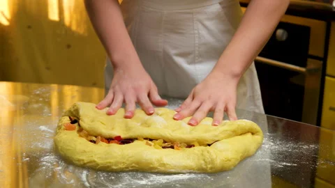 Process of baking Easter bread with raisins soaked in cognac. homemade holiday Stock Footage 346189806