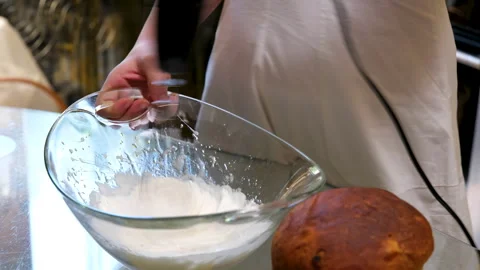 Process of baking Easter bread with raisins soaked in cognac. homemade holiday Stock Footage 346190118