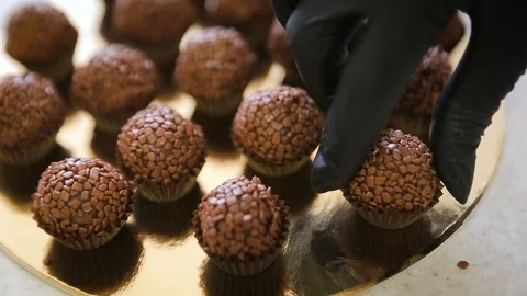 Process of baking homemade cake pops. Chef turning cake pop Stock-Footage 102368752