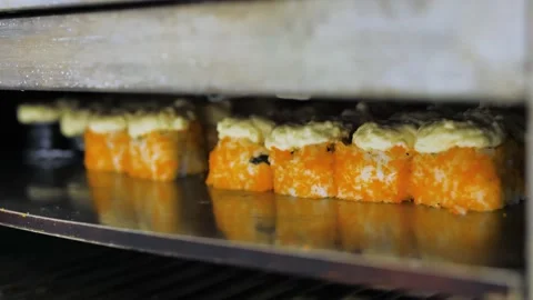 A process of baking of hot sushi in bake, 4k footage Stock Footage 237613514