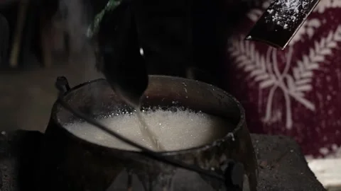 The process of boiling sap juice in a traditional kitchen takes hours Stock Footage 240071195