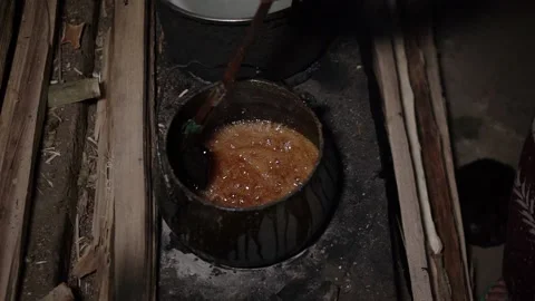 The process of boiling sap juice in a traditional kitchen takes hours Stock Footage 240071311