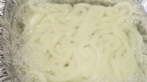 The process of boiling udon noodles Stock Footage 336652552