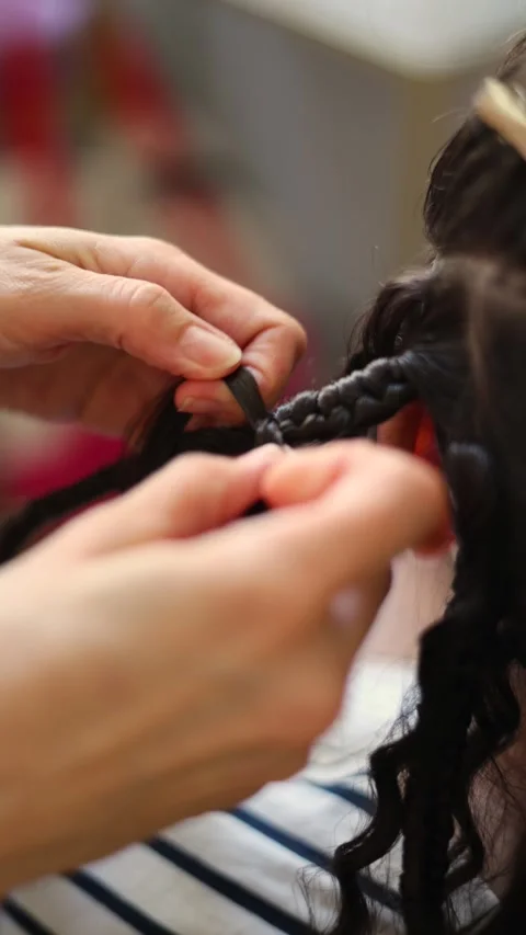 Process of braiding African braids. White brunette woman in hair salon Stock Footage 317865803