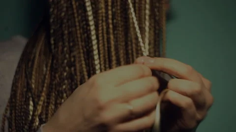 The process of braiding. It can be used in the training video. Stock Footage 57538088