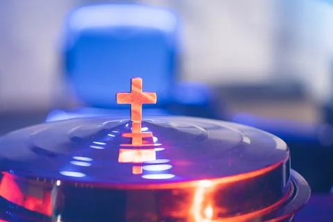 The process of breaking bread in the modern church. Stock Photos