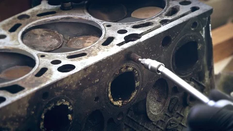 The process of breaking TORX bit. Stud does not unscrew and breaks bit Stock Footage 115359835