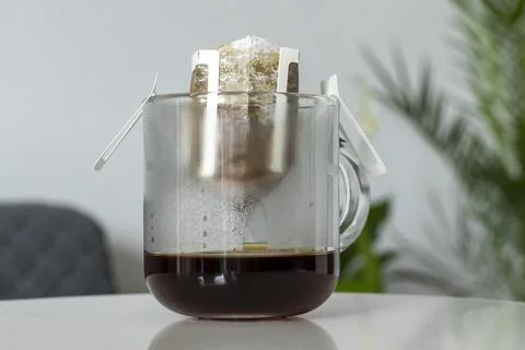 The process of brewing a drip coffee, close-up Stock Photos