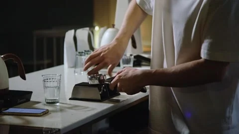 The process of brewing specialty coffee. Brewing coffee in a funnel. Stock Footage 164151643