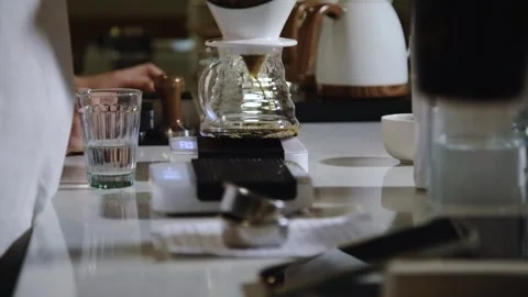 The process of brewing specialty coffee. Brewing coffee in a funnel. Stock Footage 164151672