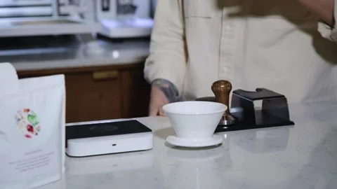 The process of brewing specialty coffee. Brewing coffee in a funnel. Stock Footage 164151702