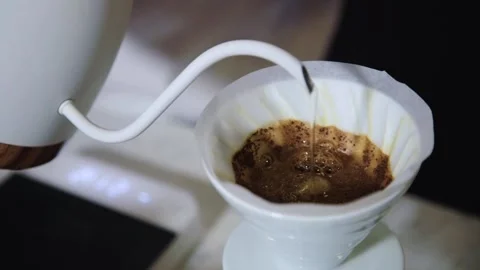 The process of brewing specialty coffee. Brewing coffee in a funnel. Stock Footage 164151837