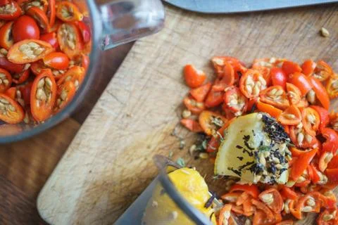 Process of brewing tea with rose hips, black tea and lemon, top view. Stock Photos