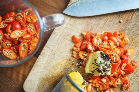 Process of brewing tea with rose hips, black tea and lemon, top view. Stock Photos