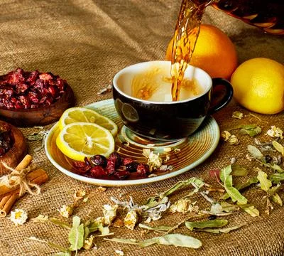 Process brewing tea, tea ceremony, Cup of freshly brewed fruit and herbal tea 스톡 사진