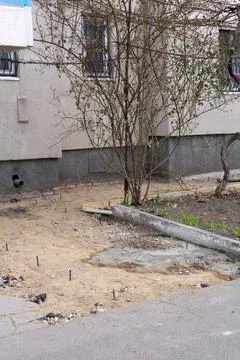 The process of building a blind area for the foundation of a house sand, crus Stock-Fotos