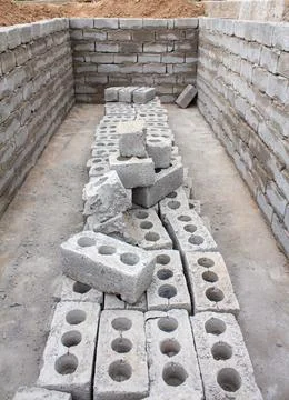 The process of building a home pool for storing water Stock Photos
