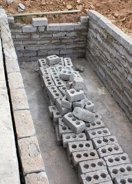 The process of building a home pool for storing water Stock Photos