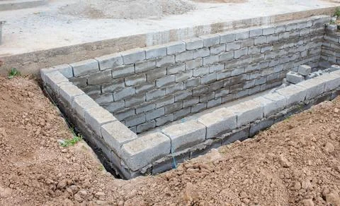 The process of building a home pool for storing water Stock Photos