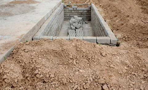 The process of building a home pool for storing water Stock Photos