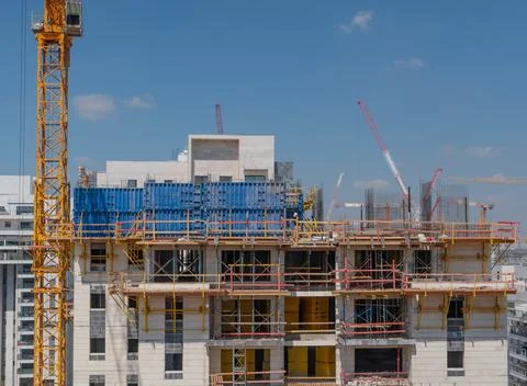 The process of building a multi-storey building, pouring concrete, laying Stock Photos