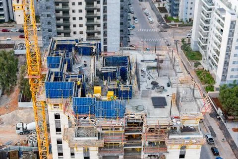 The process of building a multi-storey building, pouring concrete, laying Stock Photos