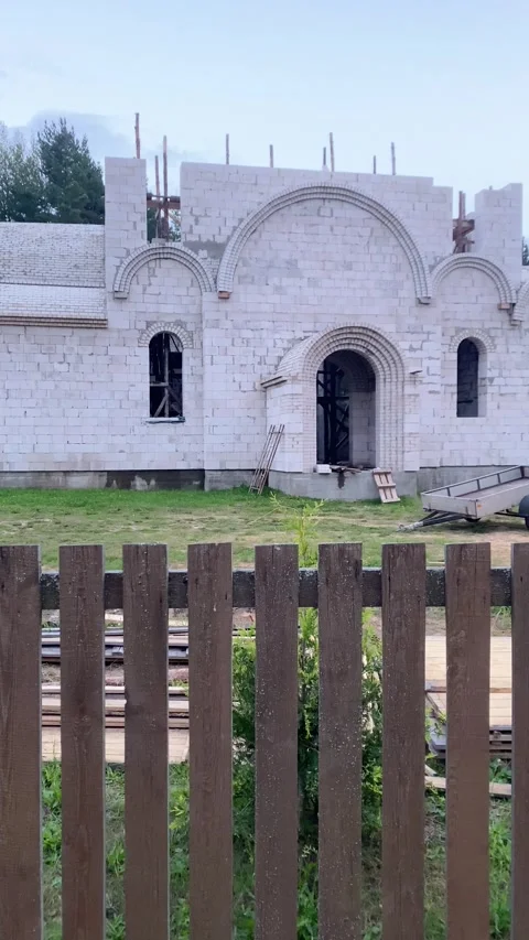 The process of building a new church. Vertical video Stock Footage 281510194