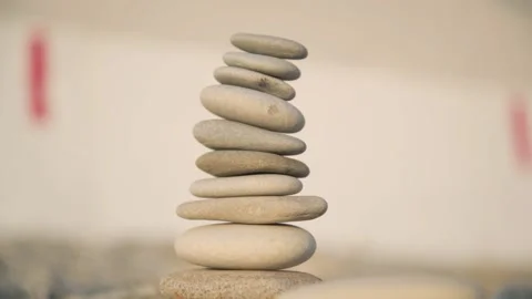 The process of building a pyramid of stones. Stock Footage 132797650