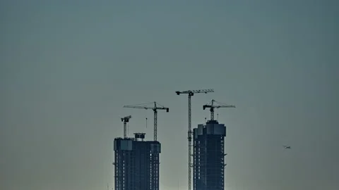 The process of building skyscrapers time lapses with the help of high-rise Stock Footage 222800166