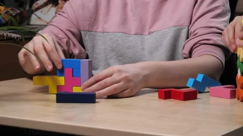 The process of building a tower of different shapes. Stock Footage 232031450