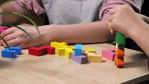 The process of building a tower of different shapes. Stock Footage 232031526