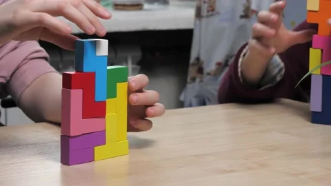 The process of building a tower of different shapes. Stock Footage 232031562