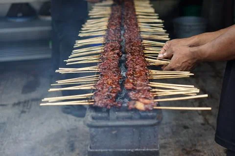 The process of burning Satay on the burning coals. Stock Photos