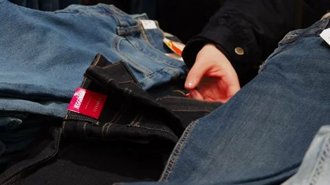 The process of buying clothes. Stock Footage 229295304