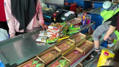 Process of calculating groceries at the cashier Stock Footage 232197807