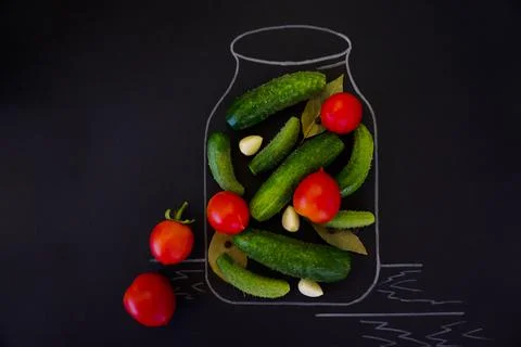 The process of canning cucumbers and tomatoes for the winter Stock Photos