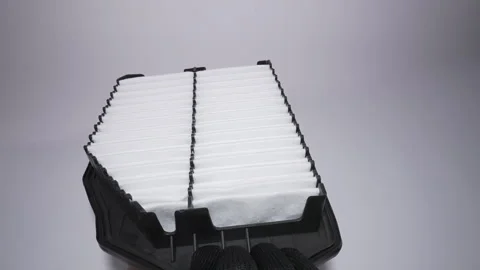 The Process of Car Air Filter Replacement Using Protective Gloves for Safety Vidéo 303812693