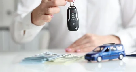 The Process of Car Key Handing Over in a Professional Business Setting and Stock Footage 299302186