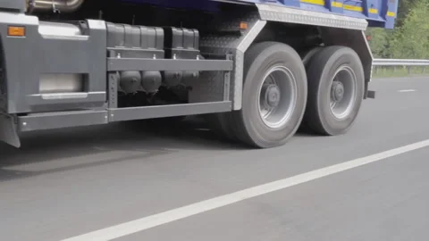 The process of cargo transportation. Scene.A huge truck with a cargo cabin Stock Footage 203971489