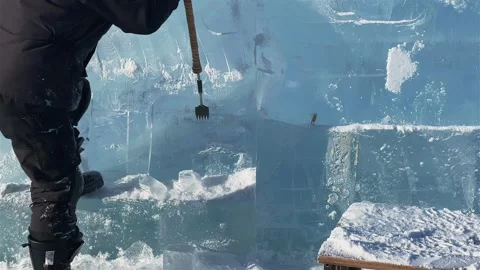 The process of carving figures out of ice on Lake Baikal Stock Footage 270257811