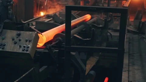 Process of casting and production of metal pipes at metallurgical plant. Red hot Stock Footage 183094828