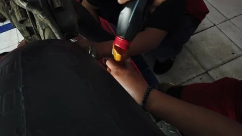 The process of changing motorcycle engine oil Stock-Footage 197446571