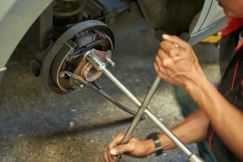 Process Of Changing Wheel Nut. Stock Photos