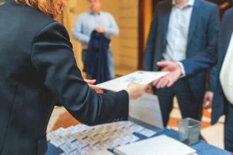 Process of checking in on a conference congress forum event, registration d.. Stock Photos