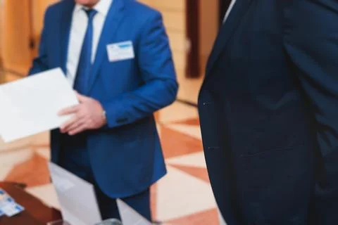 Process of checking in on a conference congress forum event, registration d.. 스톡 사진