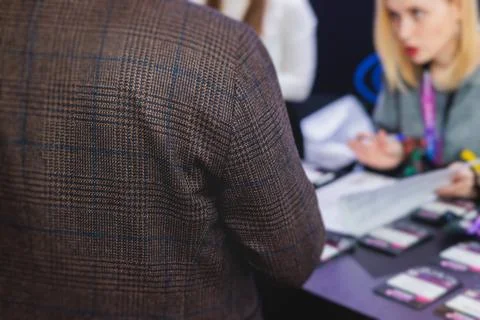 Process of checking in on a conference congress forum event, registration d.. Stock Photos